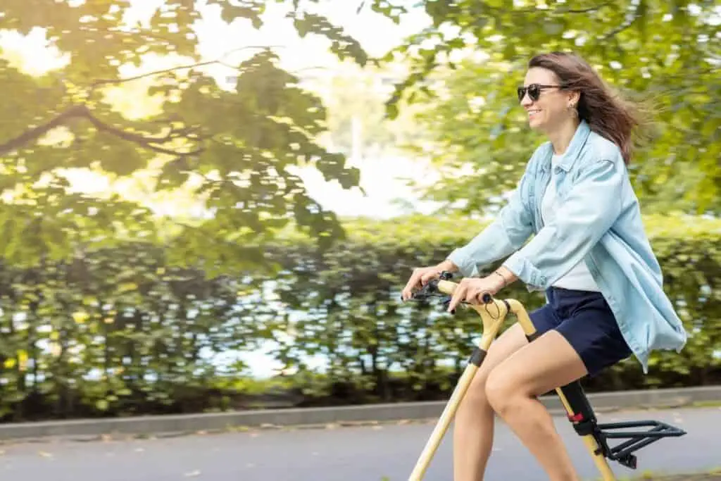 lady on a strange folding bike