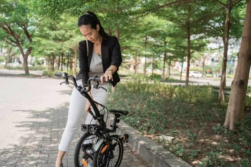 lady folding a bike