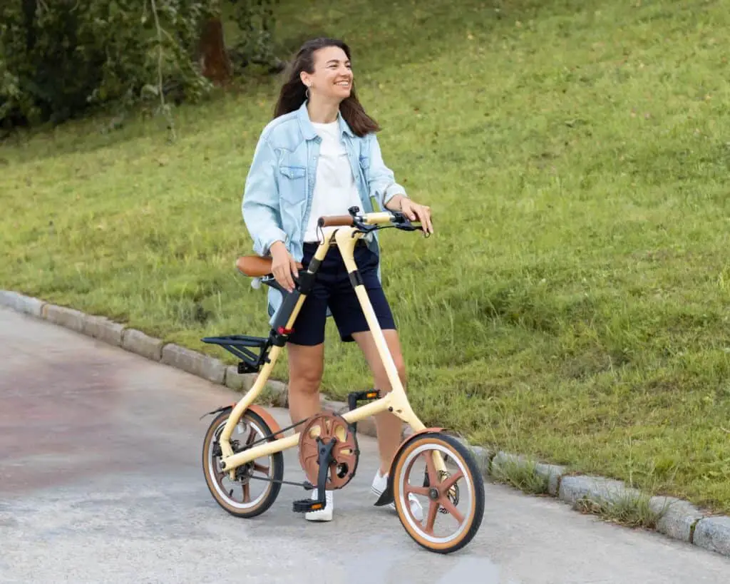 women with a silly looking folding bike