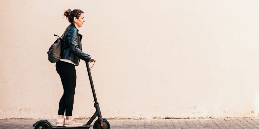 women on an electric scooter